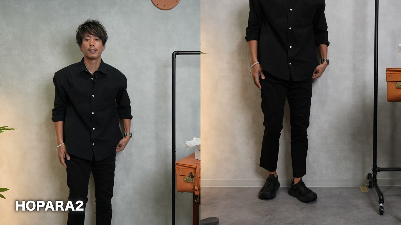 たくぞーがポプラ2を着用してオールブラックコーデで立っている全身カット