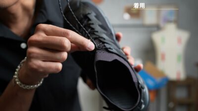 ポプラ2のドローコードを絞ってホールド感を調整しているシーン