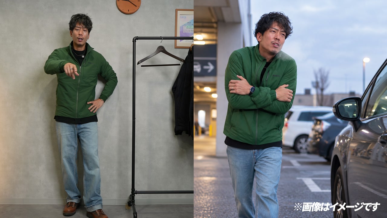 ナノエアライトジャケットを着て腕を伸ばしてストレッチ性を確認しているカット